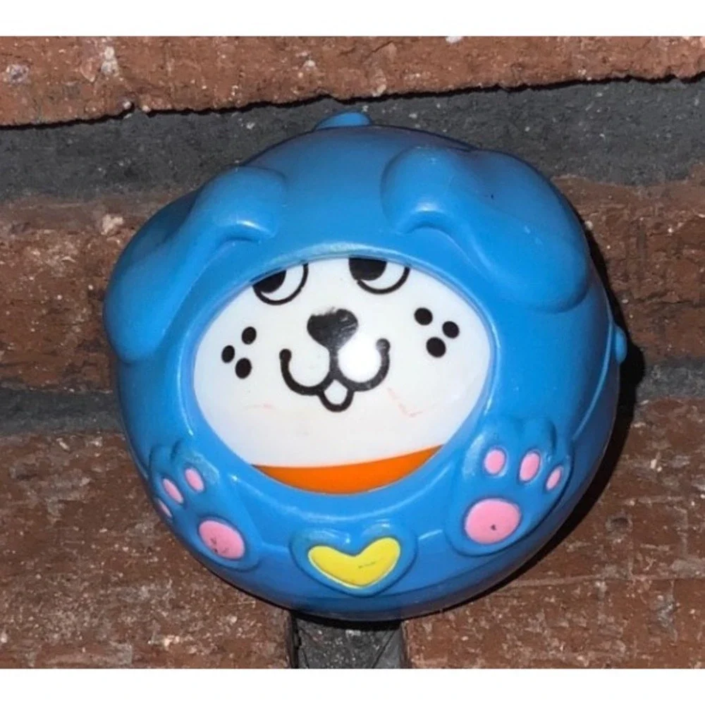 Vintage 1994 Fisher Price Roll-a-Round Blue Dog Spinning Face Ball Sensory toy